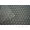 Tessuto jacquard con clip in poliestere a pois bruciato